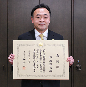 （写真12）塚越　雅信 氏