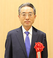 （写真）小澤　素生　氏