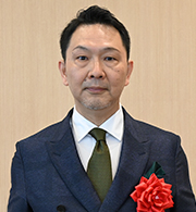 （写真）染谷 哲義　氏