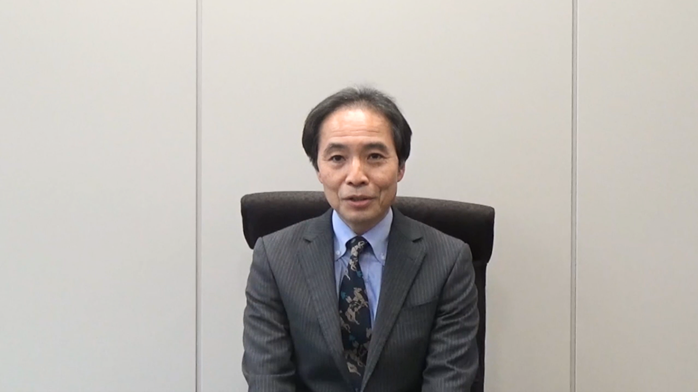 (Photo-1) 安田審査第一部長によるビデオメッセージの様子