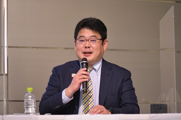 （写真8）前垣 氏