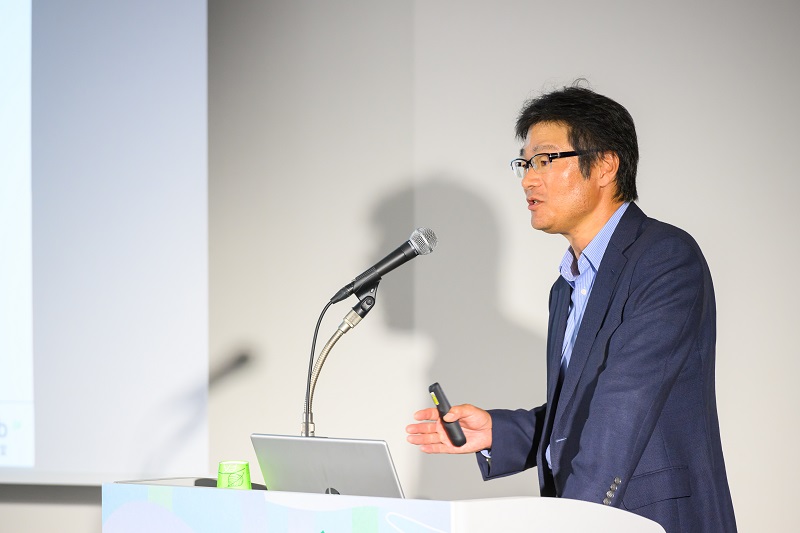 （写真）北海道大学大学院情報科学研究院　情報理工学部門複合情報工学分野　調和系工学研究室 教授　川村 秀憲氏