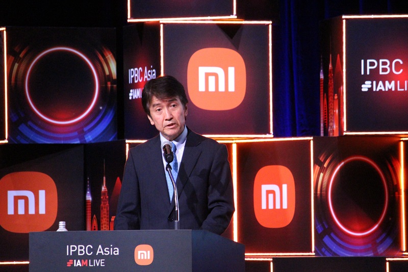 （写真1）河西長官　基調講演の様子